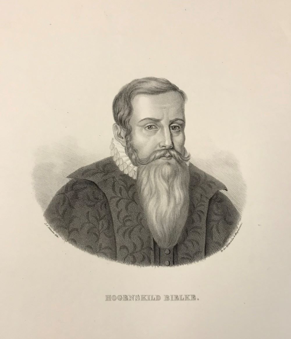 Ovalt porträtt av en man med kort hår, mustasch och långt skägg över en pipkrage.