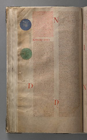 En sida i en bok med text och en grön och en blå cirkel i marginalen.