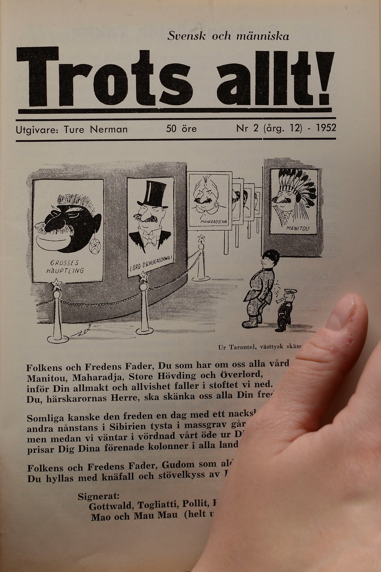 Tidningssida med karikatyrer av Stalin. 